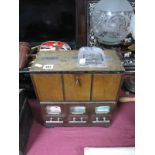 A Counter Top Cigarette Dispenser, circa 1930's, with three coin apertures to top, key lock fall