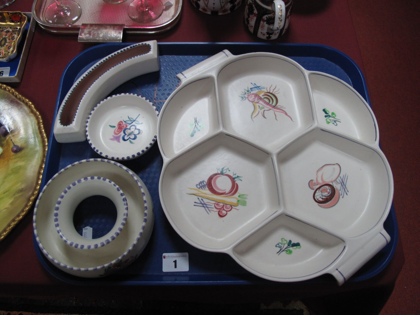 A Poole Shaped Circular Six Section Hors d'Oeuvres Dish, painted decoration, a Poole circular