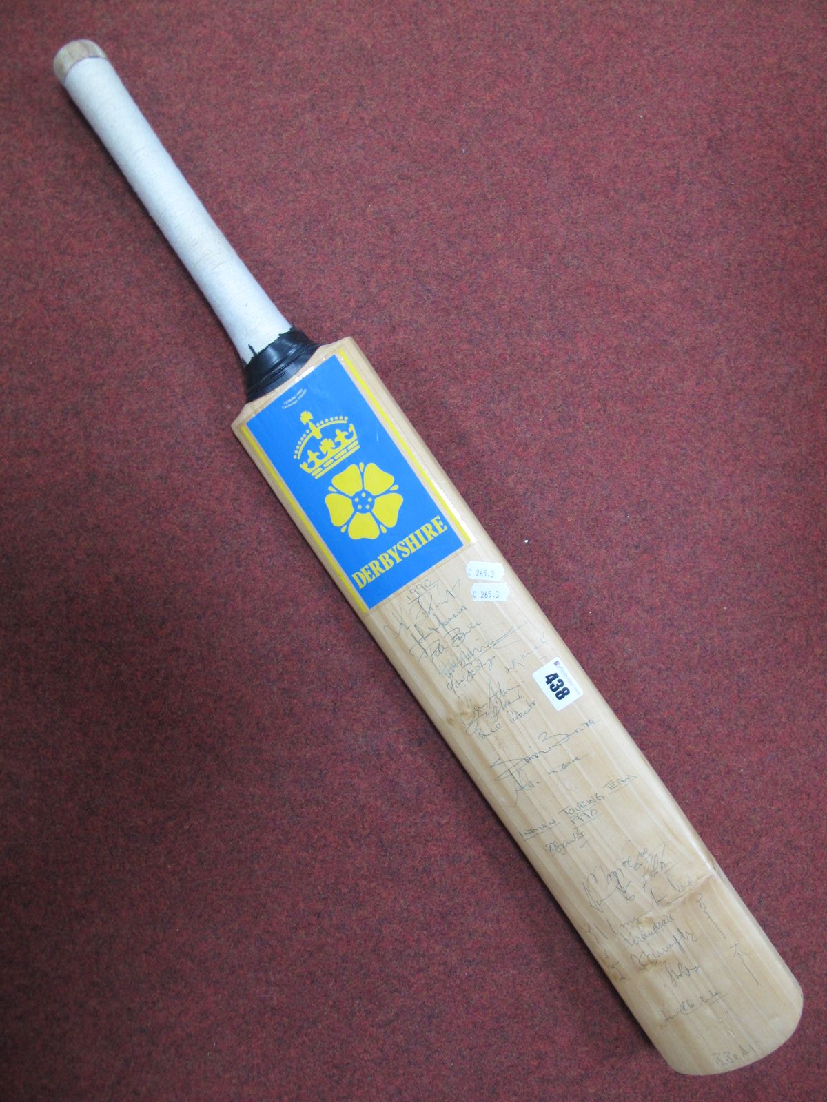 A Signed Cricket Bat, featuring signatures from Derbyshire V's Indian Touring Team 1990 names noted,