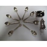 Set of Six Silver Teaspoons Birmingham, silver pepperette and salt, and various spoons.