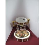 A Royal Crown Derby Imari Twin Handled Mug, and an oval box and cover, domed lid, both pattern 1128.