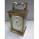 Early XX Century Brass Carriage Clock, with a carrying handle, dentil frieze, reeded sides, enamel