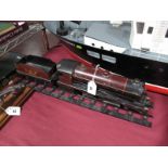 A 1930's Bowman "O" Gauge 4-4-0 Live Steam Locomotive and Tender, finished in LMS maroon R/No.13000.