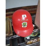 A 1960's Children's Toy Racing Helmet, with Stirling Moss/ BP transfers. Complete with inner and