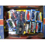 Thirty Boxed 1:43rd Scale Diecast Cars by Maisto, Burago and Others, including race cars, saloons,