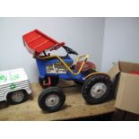 A C. 1970 Tri-ang Childs Ride On Four Wheel Tractor "Scoop A Matic". Plastic with metal parts.