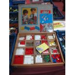 A Large Quantity of Original 1960's Lego System Bricks, windows, flats, tiles and boards, housed