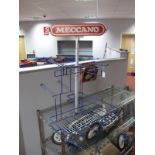 A 1980's Meccano Shop Display Stand. Blue with Meccano header. Base 56 x 56cms.