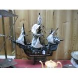 A Painted Model Galleon on Stand.