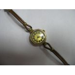 A 9ct Gold Cased Lady's Wristwatch, on leather strap.