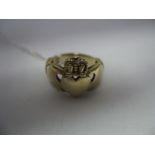 A 9ct Gold Gent's Claddagh Ring.