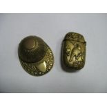 A XIX Century Caddy Spoon, in the form of a jockey's hat, together with a brass vesta case with