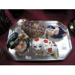 Three Royal Crown Derby Paperweights, including walrus, seal cub (each lacking stoppers),