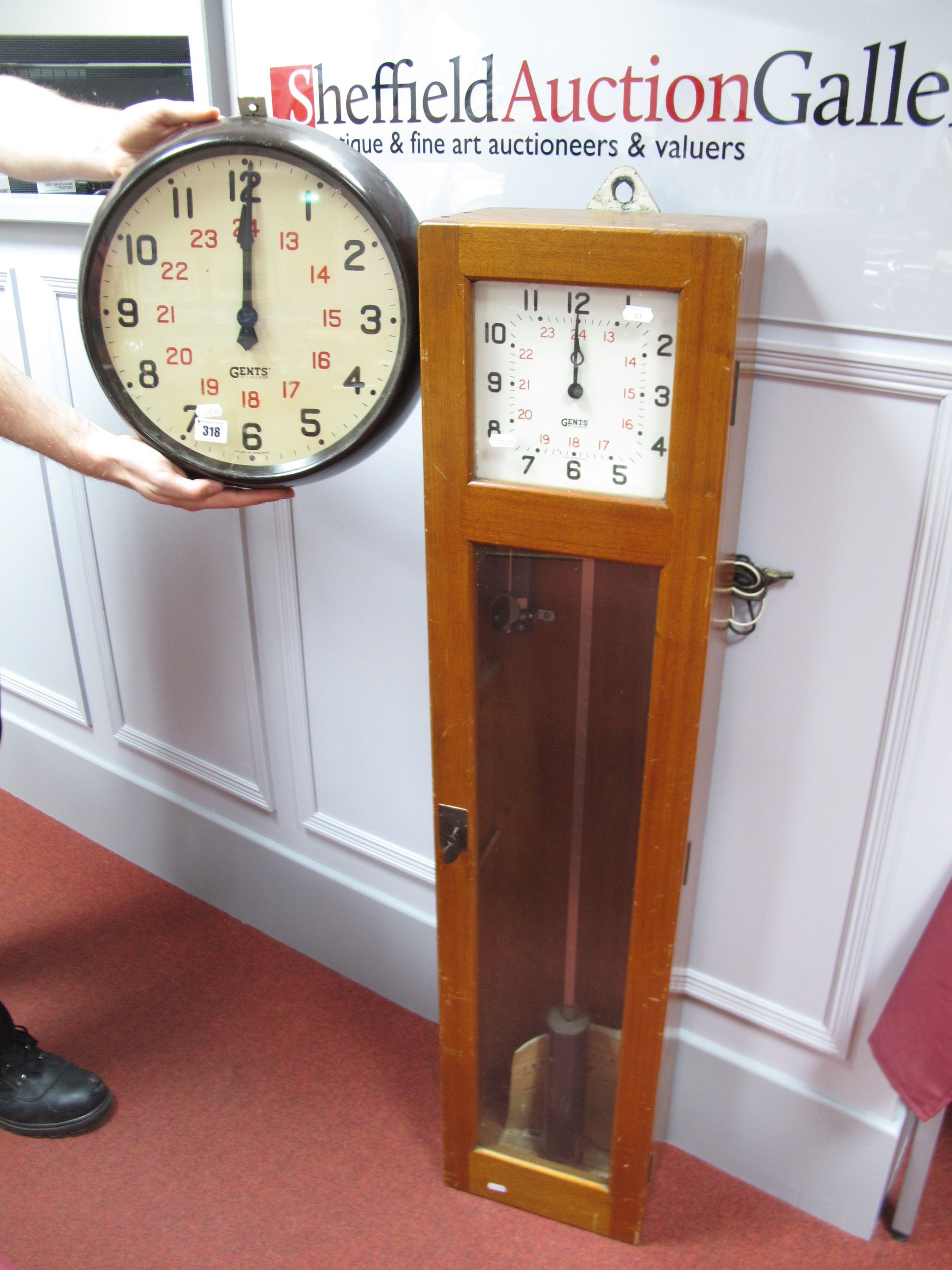 A 1950 Gents of Leicester Electronic Master Clock, in wooden case complete with pendulum and