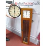 A 1950 Gents of Leicester Electronic Master Clock, in wooden case complete with pendulum and