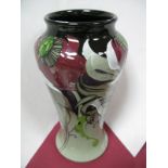 A Moorcorft Pottery Vase, decorated in the Clonter Wood design, limited edition No. 32/100, signed