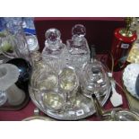 A Plated Three Piece Tea Service, cut glass decanters, on a plated circular tray.