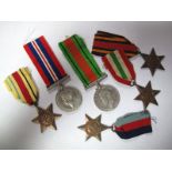 A Group of Six WWII Medals, War Medal, Defence Medal, Africa Star, Burma Star, 1939-45 Star and