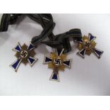 Three 1930's German Third Reich Mothers Enamel Crosses. Two gold, one bronze. All showing signs of