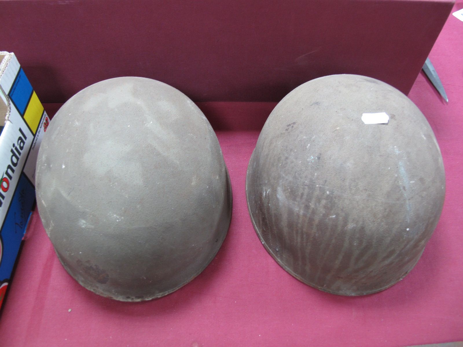 Two WWII British Despatch Rider Helmets. Both with liners, possibly replacements.