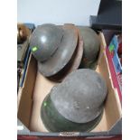 Six Mid XX Century World War Helmets, of different design and country of origin, including Belgium