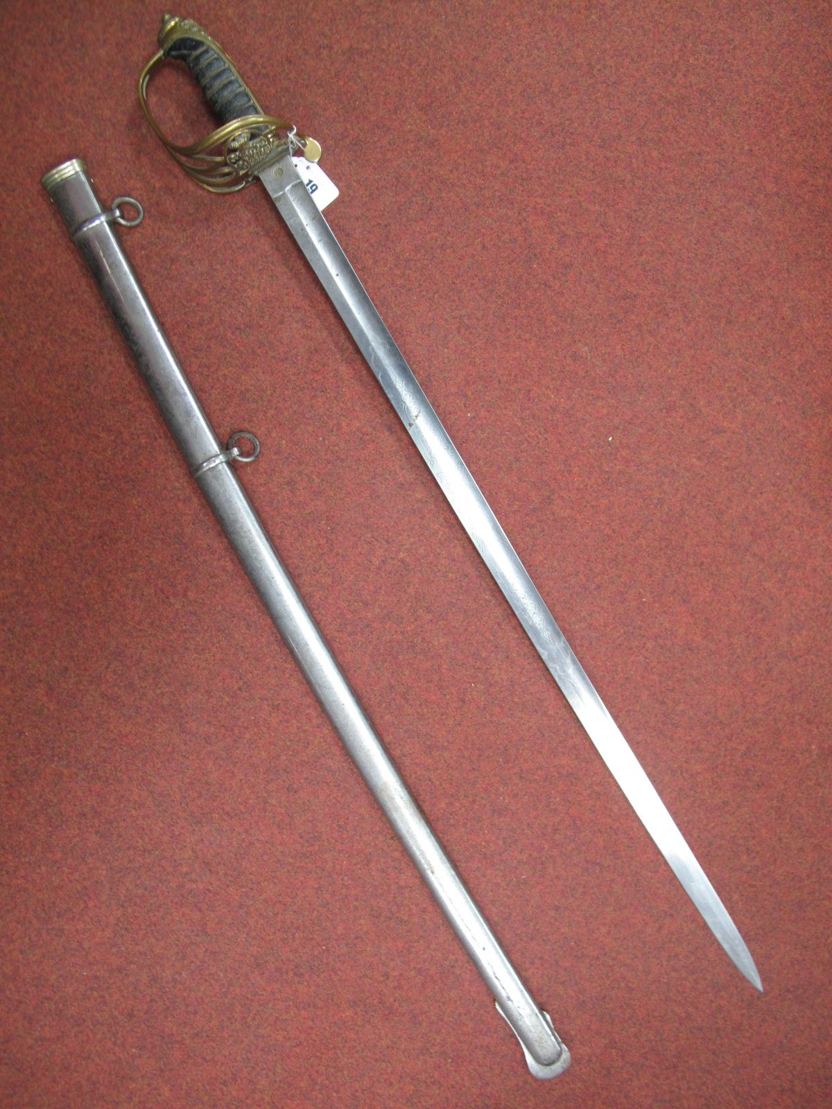 An 1845 Pattern British Infantry Offices Sword. Approximately 82cms fullered slightly curved