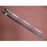 A XX Century Sword Stick of Indian Origin, with brass lion head pommel, circa 90cms long.