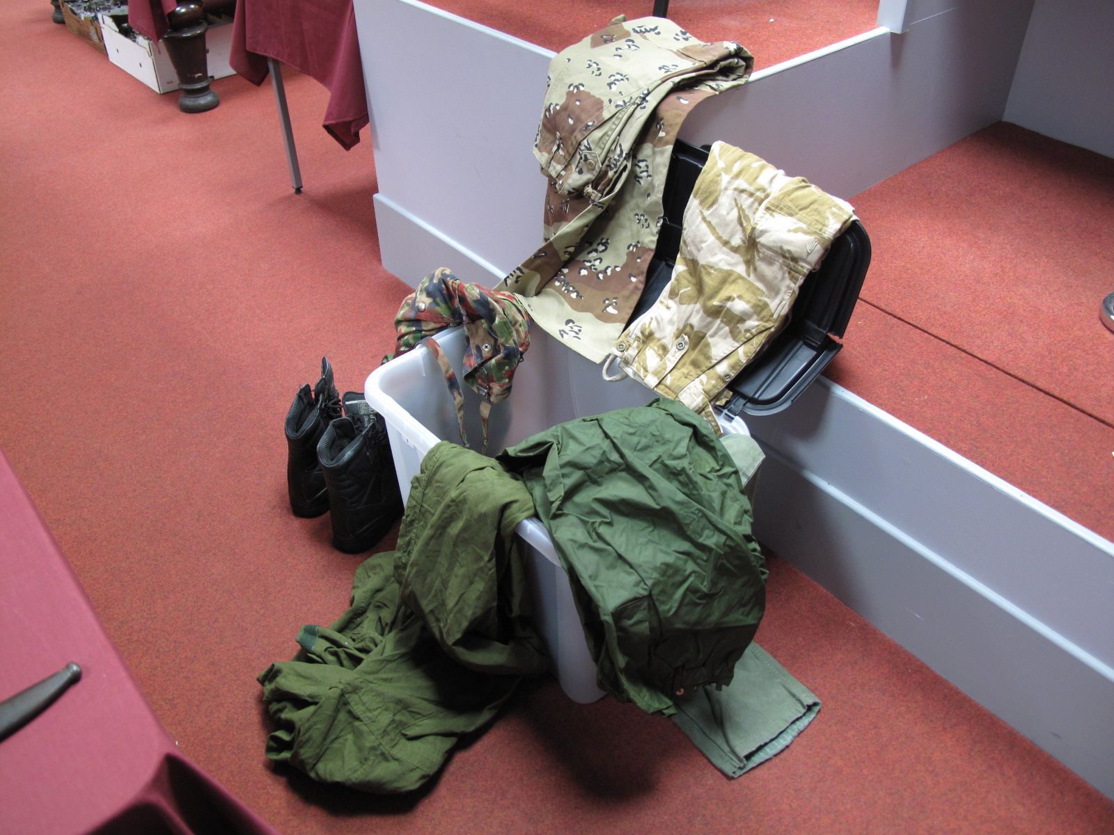 A Quantity of Different Styled Army Camouflage Trousers, and a size 8 men's Magnum boots.