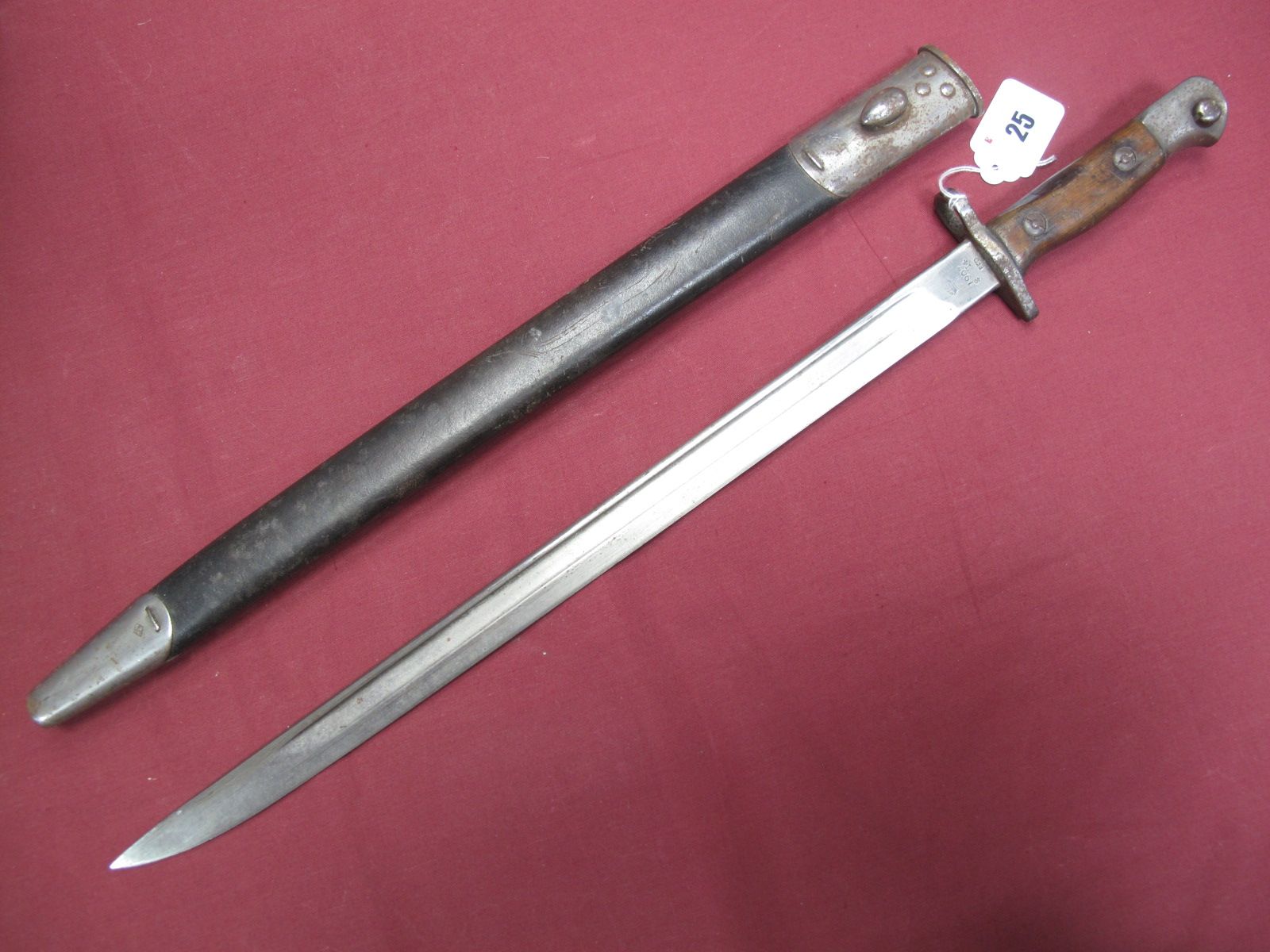 A 1907 Pattern British Bayonet. 43cms fullered blade, stamped with WD arrow and George cypher.