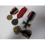 A German WWII Third Reich Medal Quartet. Comprising Eastern Front medal, War Merit Cross 2nd