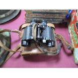 A Pair of Mid XX Century Field Binoculars, by A. Kershaw and Son. With WD stamp, in a leather case.