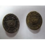Two German Third Reich Wound Badges. One hollow tin, the other silver, (damaged).