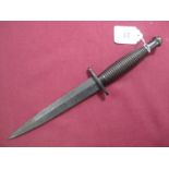 A Mid XX Century Fairburn-Sykes Fighting Knife, double edged 16cms blade, bent tip, blackened blade,