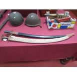A Talwar/Indian Curved Sabre, plus on later decorative sabre. Both in scabbards. Both poor