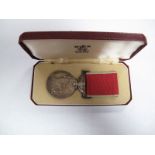 A QEII British Empire Medal, to Dennis MacDonald. Boxed.