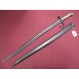 A XIX Century French Sabre Bayonet, with ribbed brass grip and spring catch operating. No.13785.