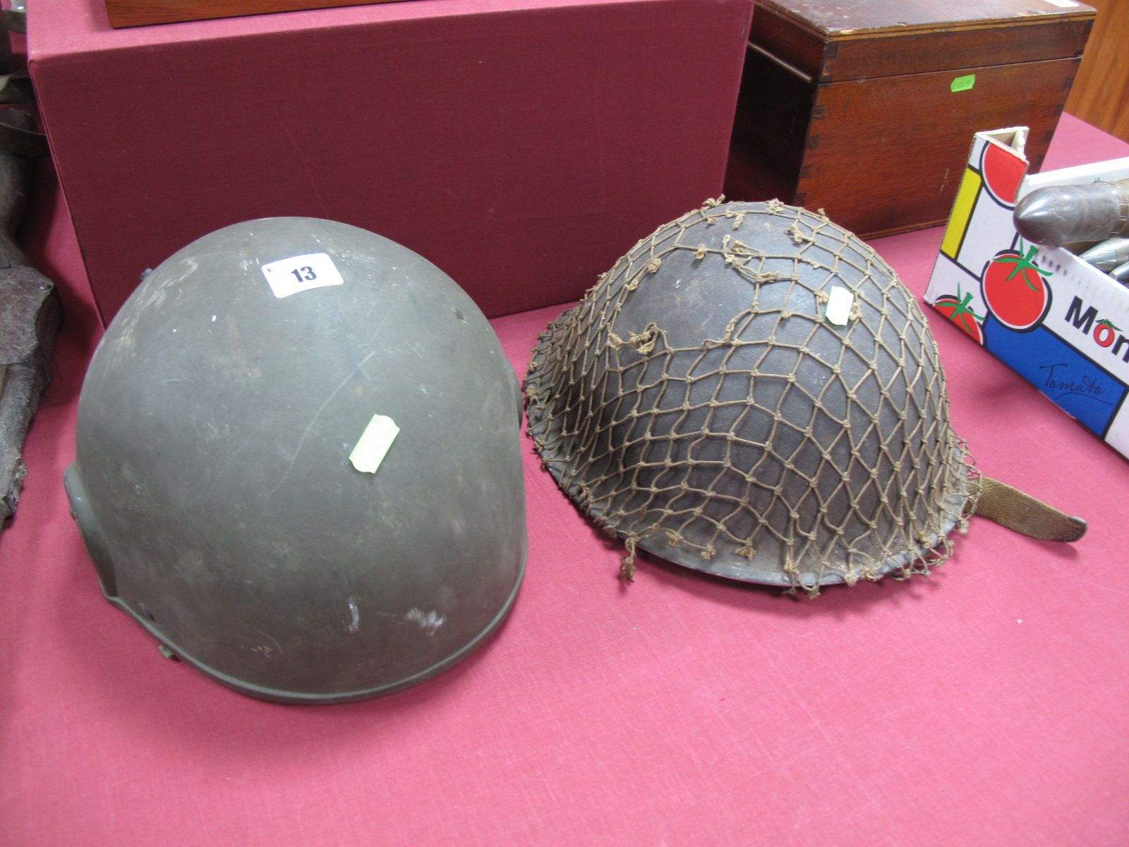 A British Army "Tommy" Helmet, and a NATO ES MK 6 combat helmet 1984 kevlar by N. E. I Electronics