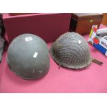 A British Army "Tommy" Helmet, and a NATO ES MK 6 combat helmet 1984 kevlar by N. E. I Electronics