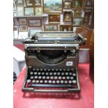 A Circa 1940's "Underwood" Typewriter, in gun metal grey.