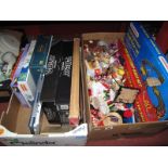 V-Beat Air Guitar, jigsaws, battery operated road race set, dolls:- Two Boxes