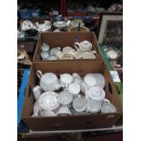 A Sandler Tea Service, comprising cups, saucers, milk jug, teapot, in "Romance" pattern, together