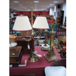 A Twin Branch Brass Candlestick Table Lamp; a brass Corinthian column table lamp and an onyx table