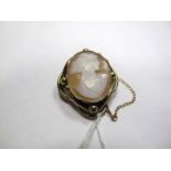 XIX Century Cameo Brooch, with female profiles in openwork surround with safety chain.