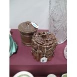 Two XIX Century Treacle Glaze Stoneware Tobacco Jars, one of naturalistic form with ivy