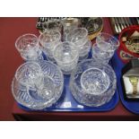 A Set of Twelve Cut Glass Pedestal Dessert Dishes and two cut glass fruit bowls:- One Tray