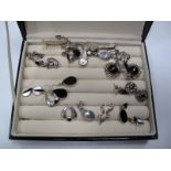 A Collection of "925" and Other Modern Earrings, contained in a case.