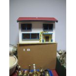 A Circa 1970 Dolls House by Shardlow of Derby. Sliding front door to four rooms. 45cms x 30cms x