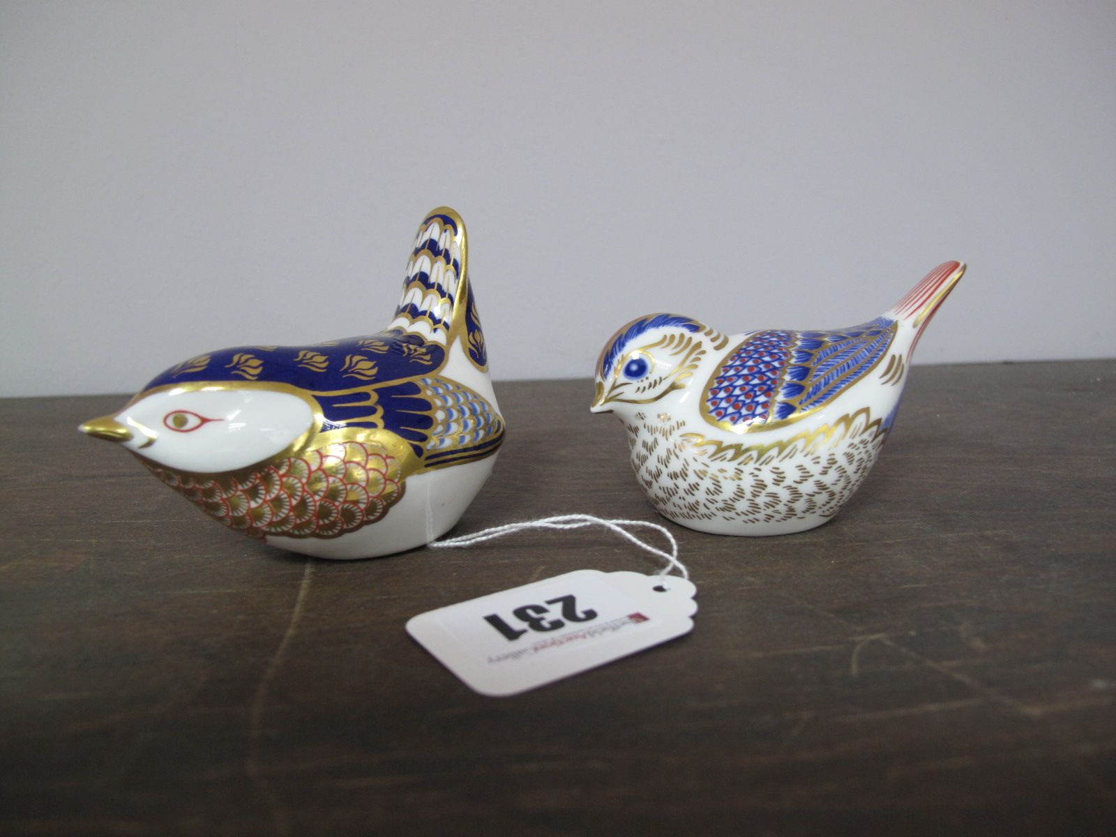 Royal Crown Derby Imari Paperweights - Blue Tit, gold stopper and Wren, lacking stopper.(2)