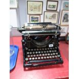 A Circa 1920's "Underwood" Typewriter, in black.