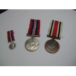 A George V Special Constabulary Faithful Service Medal, to E. Dyson, plus a WWII War Medal and